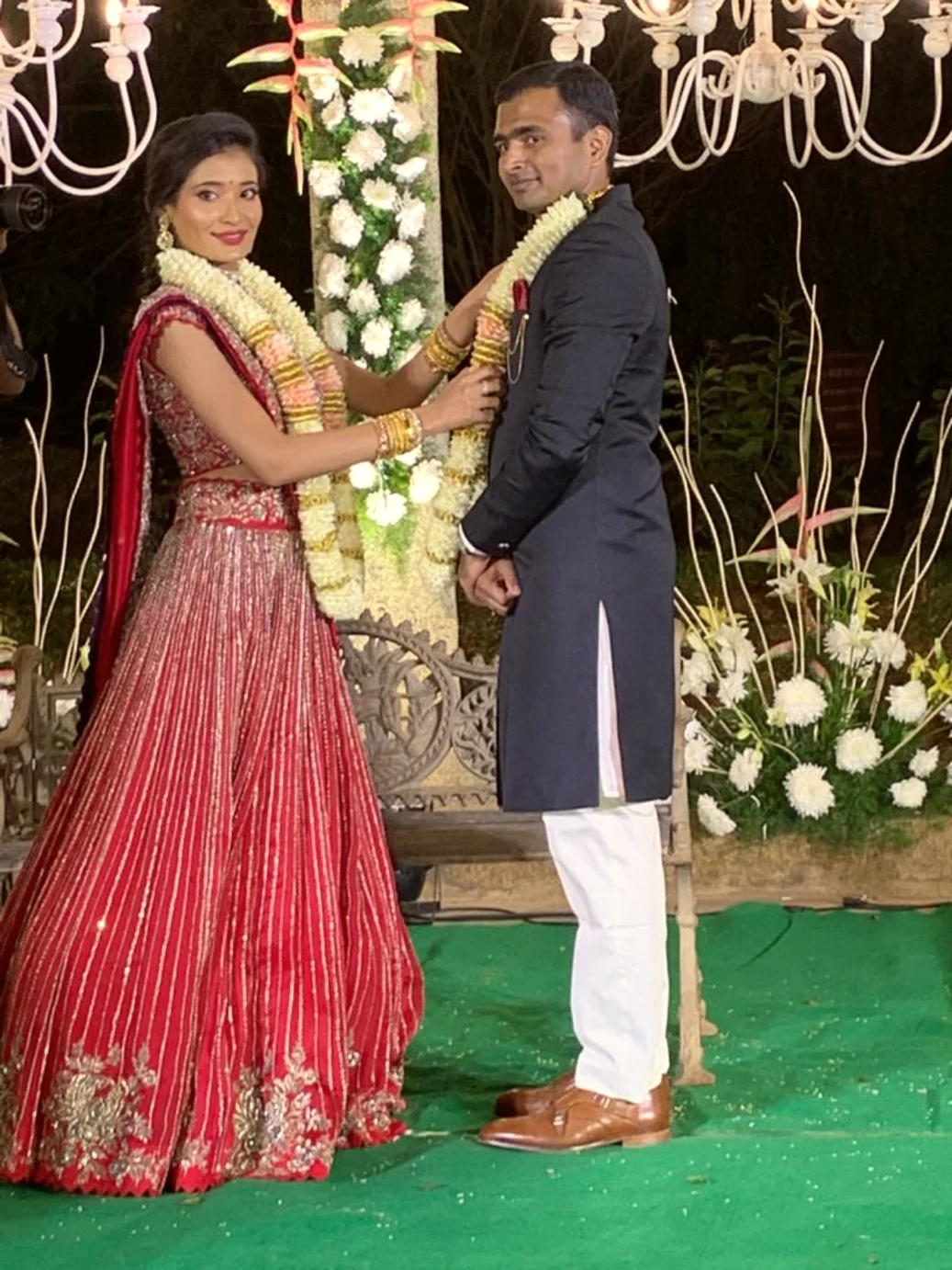 Bride and groom standing together on the wedding stage, Anubhandhaa Bangalore